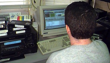 A student using new computer software to edit a video.
